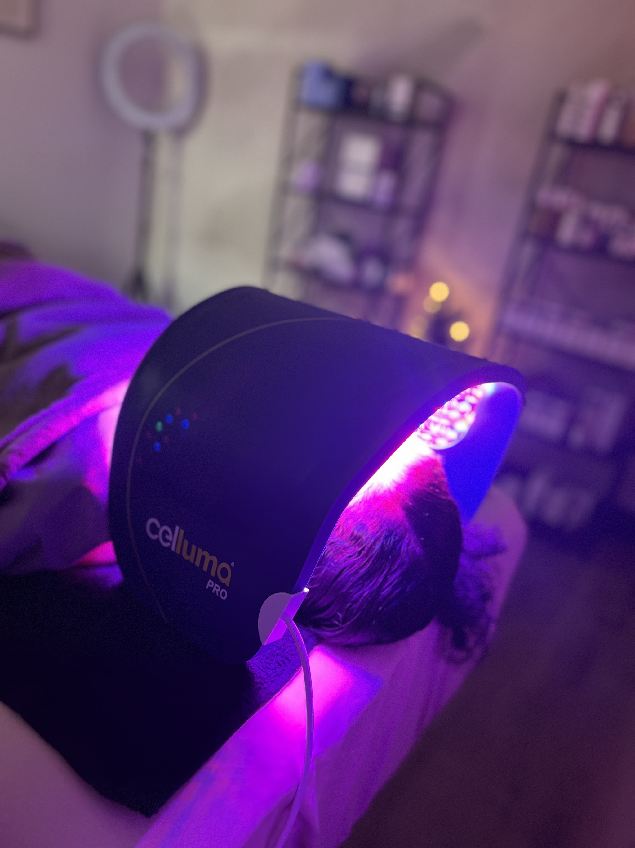 LED light therapy lamp glowing in the treatment room
